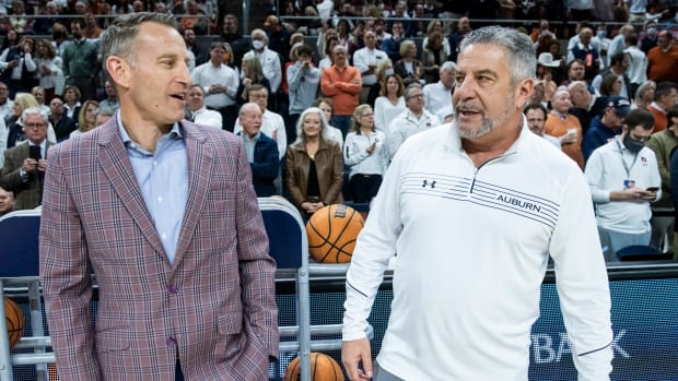 Auburn Tigers head coach Bruce Pearl and Alabama Crimson Tide head coach Nate Oats talk before the game at Auburn Arena in Auburn, Ala., on Tuesday, Feb. 1, 2022. Auburn Tigers lead Alabama Crimson Tide at halftime 51-37.  